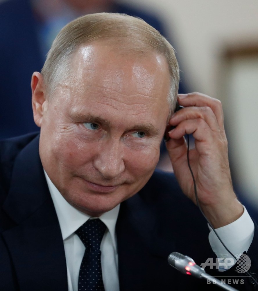 若きプーチン氏は「実直で自制心ある」スパイ KGBの文書公開 写真1枚 国際ニュース：AFPBB News