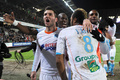 12-13フランス・リーグ1は26日、第22節の試合が各地で行われ、オリンピック・マルセイユ（ Olympique de Marseille）は2-2でレンヌ（Stade Rennes FC）と引き分けた。

後半38分にジョルダン・アイェウ（Jordan Ayew、右）が決めたチームの2得点目を喜ぶロド・ファニ（Rod Fanni、中央奥）、モルガン・アマルフィタノ（Morgan Amalfitano、左）らオリンピック・マルセイユの選手（2013年1月26日撮影）。(c)AFP/JEAN FRANCOIS MONIER