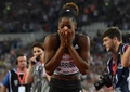 陸上、ダイヤモンドリーグ第10戦ロンドン大会、女子100メートルハードル決勝。世界新記録樹立に驚いた様子をみせるケンドラ・ハリソン（2016年7月22日撮影）。(c)AFP/Ben STANSALL