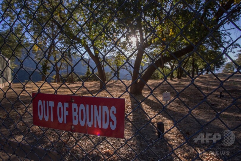 山火事と闘う受刑者たち、時給1ドルの消火プログラム 米加州