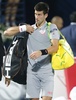 ドバイ・テニス選手権（Dubai Duty Free Tennis Championships 2014）、男子シングルス準決勝。コートを後にするノバク・ジョコビッチ（Novak Djokovic、2014年2月28日撮影）。(c)AFP/KARIM SAHIB