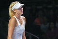 女子テニス、WTAツアー選手権（BNP Paribas WTA Championships - Singapore 2014）4日目。落胆した表情をみせるマリア・シャラポワ（Maria Sharapova、2014年10月23日撮影）。(c)AFP/ROSLAN RAHMAN