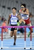 第17回アジア競技大会（17th Asian Games、Asiad）陸上男子400メートルハードル決勝のレースに臨む岸本鷹幸（Takayuki Kishimoto、2014年10月1日撮影）。(c)AFP/MMARTIN BUREAU