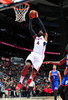 14-15NBA、アトランタ・ホークス対フィラデルフィア・セブンティシクサーズ。ダンクシュートを決めるアトランタ・ホークスのポール・ミルサップ（2015年1月31日撮影）。(c)AFP/Getty Images/NBAE/Scott Cunningham