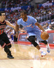 13-14NBA、ロサンゼルス・クリッパーズ（Los Angeles Clippers）対シカゴ・ブルズ（Chicago Bulls）。ドライブで切り込むロサンゼルス・クリッパーズのクリス・ポール（Chris Paul、2013年11月24日撮影）。(c)AFP/Getty Images/NBAE/Stephen Dunn