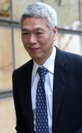 シンガポールお家騒動、首相の弟「リー一族は政界から退くべき」