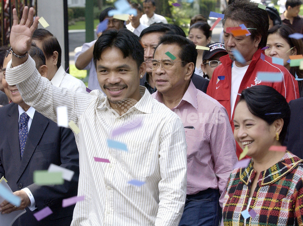 マニー・パッキャオ フィリピンへ凱旋帰国 写真3枚 国際ニュース