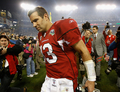 08NFL第43回スーパーボウル、落胆した表情でフィールドを後にするアリゾナ・カーディナルスのカート・ワーナー（%%Kurt Warner%%）。（2009年2月1日撮影）(c)AFP/Getty Images/Chris Graythen