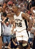Sean Elliott of the San Antonio Spurs celebrates his winning three-point shot against the Portland Trail Blazers during game two of the NBA Western Conference Finals 31 May 1999 at the Alamodome in San Antonio, TX. (c)AFP/Paul BUCK