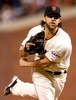 14MLBワールドシリーズ（7回戦制）第5戦、サンフランシスコ・ジャイアンツ（San Francisco Giants）対カンザスシティ・ロイヤルズ（Kansas City Royals）。先発登板するサンフランシスコ・ジャイアンツのマディソン・バンガーナー（Madison Bumgarner、2014年10月26日撮影）。(c)AFP/Getty Images/Elsa