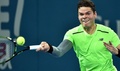 テニス、ブリスベーン国際（Brisbane International 2015）男子シングルス決勝。リターンを狙うミロス・ラオニッチ（Milos Raonic、2015年1月11日撮影）。(c)AFP/Saeed KHAN