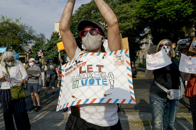 米下院、2.6兆円の郵政公社支援法案可決 郵便投票で論議