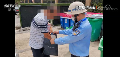 不注意で捨ててしまった現金13万元、警官が団地内のごみ箱一つ一つ調べ見つけ出す