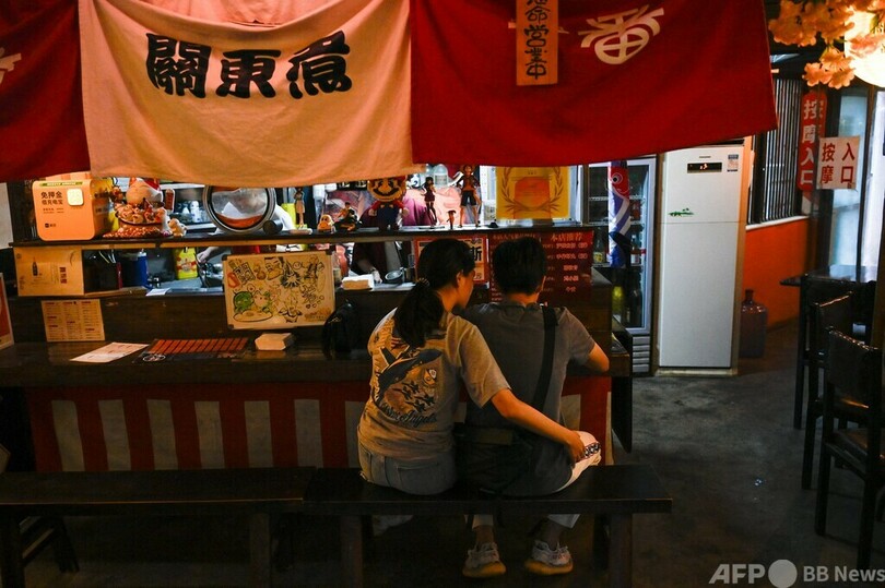 「日本の水産物の提供中断」 北京の飲食店街にポスター