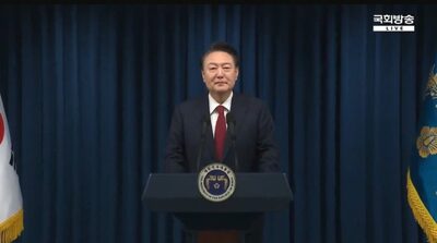 韓国・ネット上で出回る「尹大統領が国民向け談話で笑いをこらえている」疑惑の映像