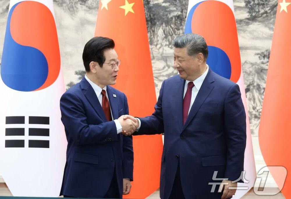 韓中首脳、「非核化」言及を意図的に回避…北朝鮮の反発を考慮か 写真枚