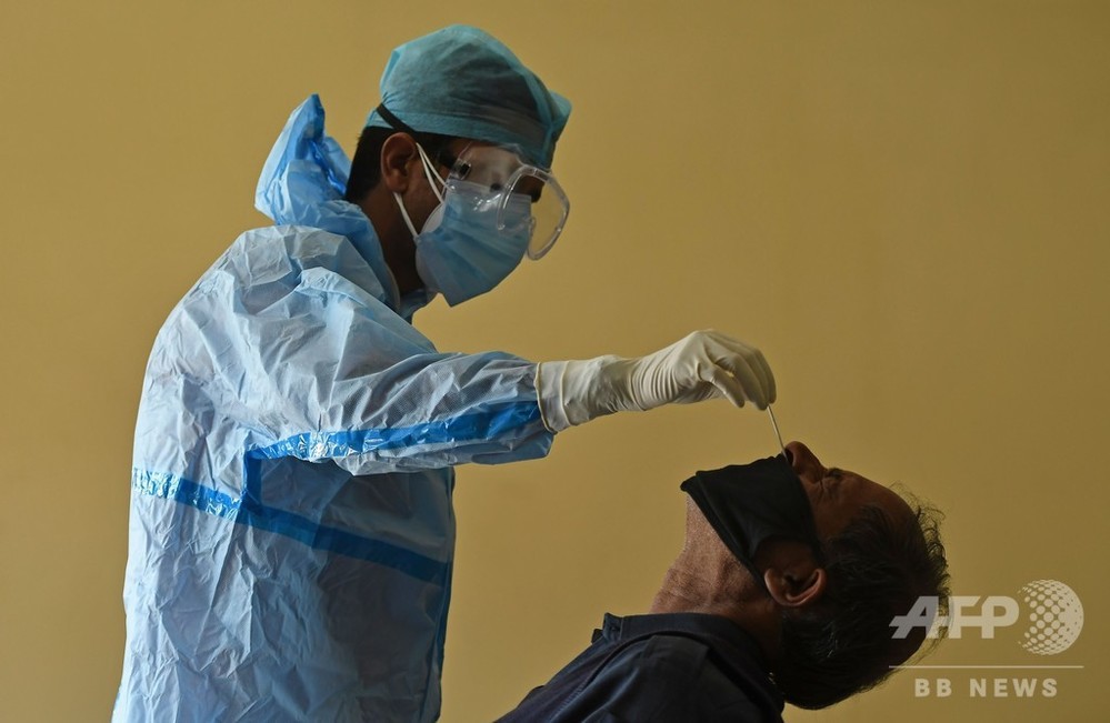 WHO、世界人口1割が感染と推計 組織改革の加速示唆 写真7枚 国際ニュース:AFPBB News