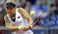 女子テニス、国別対抗戦フェドカップ、ワールドグループ1部準決勝、ロシア対ドイツ。リターンを狙うドイツのザビーネ・リシキ（2015年4月18日撮影）。(c)AFP/ALEXANDER NEMENOV