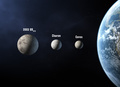 準惑星ケレス（左から3つ目）の想像図（2006年8月17日撮影）。(c)AFP