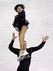 14-15フィギュアスケートグランプリ（GP）シリーズ開幕戦スケート・アメリカ（Skate America 2014）、ペア・フリースケーティング（FS）。演技に臨む川口悠子（Yuko Kawaguchi）/アレクサンドル・スミルノフ（Alexander Smirnov）組（2014年10月26日撮影）。(c)AFP/Getty Images/Jonathan Daniel
