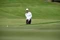 女子ゴルフ、HSBC女子チャンピオンズ（HSBC Women&apos;s Champions 2014）3日目。ショットを打つカリー・ウェブ（Karrie Webb、2014年3月1日撮影）。(c)AFP/ROSLAN RAHMAN
