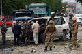 アフガニスタンの首都カブール（Kabul）で、大統領候補のアブドラ・アブドラ（Abdullah Abdullah）元外相の車列を狙ったとみられる自爆攻撃があった現場（2014年6月6日撮影）。(c)AFP/Wakil Kohsar