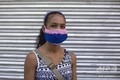 【写真特集】ウイルス対策も工夫次第? 素材も形もさまざまな「マスク」 ドミニカ共和国のサントドミンゴで、マスクを着けた女性(2020年4月22日撮影)。(c)Erika SANTELICES / afp
