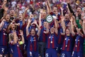 女子サッカー欧州チャンピオンズリーグ決勝、FCバルセロナ対オリンピック・リヨン。優勝を喜ぶFCバルセロナの選手ら（2024年5月25日撮影）。(c)Pierre-Philippe MARCOU / AFP