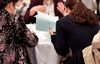 Japan scraps idea to woo women out of city with cash