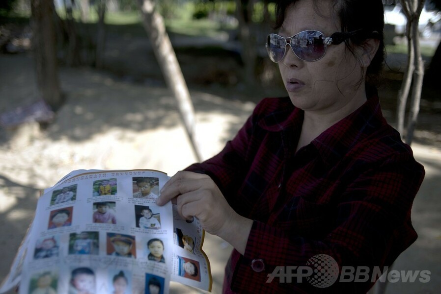 中国で横行する人身売買、17年かけて息子を捜した女性の悲劇