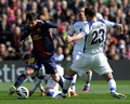 12-13スペイン1部リーグは10日、第23節の試合が各地で行われ、FC バルセロナ（FC Barcelona）が6-1でヘタフェ（Getafe CF）に大勝した。

ヘタフェの守備陣をかわすFCバルセロナのリオネル・メッシ（Lionel Messi、2013年2月10日撮影）。(c)AFP/LLUIS GENE