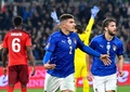 2022年サッカーW杯カタール大会欧州予選グループC、イタリア対スイス。同点ゴールを喜ぶイタリアのジョバンニ・ディ・ロレンツォ（中央、2021年11月12日撮影）。(c)Alberto PIZZOLI / AFP