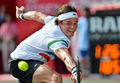 男子テニス、楽天ジャパンオープン（Rakuten Japan Open Tennis Championships 2012）は6日、東京の有明コロシアム（Ariake Coliseum）でシングルス準決勝が行われ、大会第6シードのミロス・ラオニッチ（Milos Raonic、カナダ）は6-3、6-7、7-6で第1シードのアンディ・マレー（Andy Murray、英国）を下し、決勝に進出した。

リターンを打つミロス・ラオニッチ（2012年10月6日撮影）。(c)AFP/KAZUHIRO NOGI