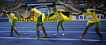 第12回世界陸上ベルリン大会（%%12th IAAF World Championships in Athletics Berlin%%）男子4×100メートルリレー決勝。ジャマイカが37秒31の大会新記録で優勝した。37秒62でトリニダード・トバゴが2位に、38秒02で英国が3位に入った。日本は38秒30で4位に入り、惜しくもメダル獲得を逃した。

　ウサイン・ボルト（%%Usain Bolt%%）は、第3走者としてジャマイカの金メダル獲得に貢献し、%%北京五輪%%に続き世界選手権でも短距離（100メートル、200メートル、4×100メートルリレー）3冠に輝いた。写真は優勝を果たし、走順に並ぶ（右から）スティーブ・マリングス（%%Steve Mullings%%）、マイケル・フレイター（%%Michael Frater%%）、ウサイン・ボルト、アサファ・パウエル（%%Asafa Powell%%）。（2009年8月22日撮影）(c)AFP/FABRICE COFFRINI