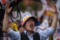韓国・ソウル中心部で行われた、文在寅（ムン・ジェイン）大統領の退陣を要求するデモの参加者（2019年10月3日撮影）。(c）Ed JONES / AFP