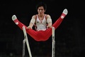 リオデジャネイロ五輪、体操男子予選。平行棒の演技に臨む加藤凌平（2016年8月6日撮影）。(c)AFP/Ben STANSALL
