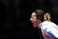 リオデジャネイロ五輪、フェンシング女子フルーレ個人準決勝。チュニジア代表に勝利し、叫び声をあげるイタリアのエリーザ・ディフランチェスカ（2016年8月10日撮影）。(c)AFP/Kirill KUDRYAVTSEV