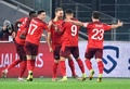 2022年サッカーW杯カタール大会欧州予選グループC、イタリア対スイス。先制点を決めて、チームメートと喜ぶスイスのシルヴァン・ビドマー（中央、2021年11月12日撮影）。(c)Alberto PIZZOLI / AFP
