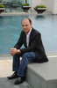 香港を訪れたシューズデザイナーのジミー・チュウ（Jimmy Choo、2011年3月11日撮影）。(c)AFP/MIKE CLARKE