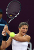 女子テニス、カタール・トータル・オープン（Qatar Total Open 2013）は13日、ドーハ（Doha）でシングルス2回戦が行われ、大会第6シードのサラ・エラーニ（Sara Errani、イタリア）は6-4、6-0でハンガリーのティメア・バボス（Timea Babos）に勝利し、3回戦進出を決めた。

リターンを打つサラ・エラーニ（2013年2月13日撮影）。(c)AFP/AL-WATAN DOHA/KARIM JAAFAR