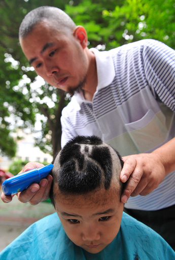 ヘアスタイルも五輪型に、北京市の学校