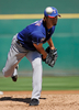 12MLBオープン戦は13日、各地で行われ、テキサス・レンジャーズ（Texas Rangers）のダルビッシュ有（Yu Darvish）は、クリーブランド・インディアンス（Cleveland Indians）戦に先発し、3回を投げて3安打、4四球を与え2失点を喫した。

投球するレンジャーズのダルビッシュ有（2012年3月13日撮影）。(c)AFP/Getty Images/Kevork Djansezian