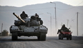 グルジア・ゴリ（Gori）から後退するグルジア軍（2008年8月11日撮影）。(c)AFP/DIMITAR DILKOFF