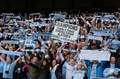 13-14イングランド・プレミアリーグ最終第38節、マンチェスター・シティ（Manchester City）対ウェストハム（West Ham）。優勝を喜ぶマンチェスター・シティのサポーター（2014年5月11日撮影）。(c)AFP/ANDREW YATES