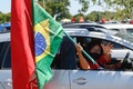ブラジルの首都ブラジリアで行われたジャイル・ボルソナロ大統領の退陣を求めるデモの参加者（2021年1月23日撮影）。(c)Sergio Lima / AFP