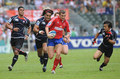 ロシアの%%Nikolay Shugay%%（中央）を追う日本の選手たち。(c)AFP/ANDREW ROSS