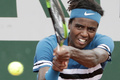 全仏オープンテニス、男子シングルス2回戦。リターンを打つエリアス・イメル（2018年5月31日撮影）。(c)AFP PHOTO / Thomas SAMSON