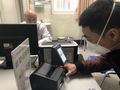 診察室で「指決済」する患者（2020年1月20日撮影）。(c)Xinhua News