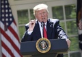 米首都ワシントンのホワイトハウスで、パリ協定離脱の決断を表明するドナルド・トランプ大統領（2017年6月1日撮影）。(c)AFP/SAUL LOEB