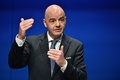 スイス・チューリヒのFIFA本部で行われた記者会見に臨むジャンニ・インファンティーノ会長（2017年1月10日撮影）。(c)AFP/Michael BUHOLZER
